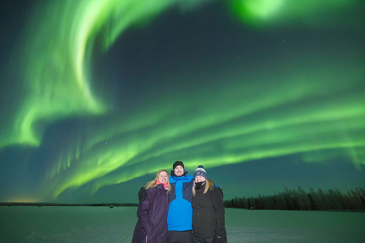 Happy aurora tour guests in Fairbanks